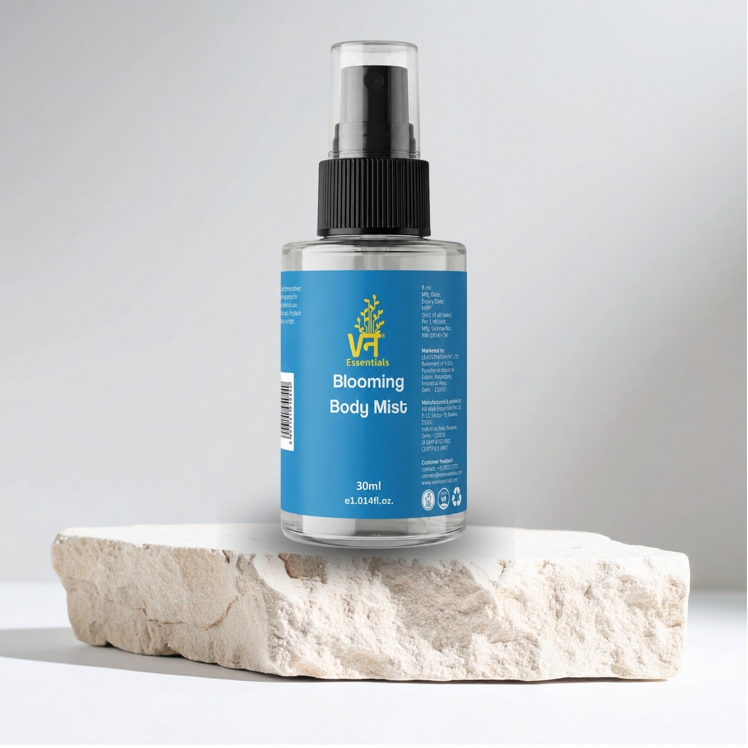 A 30ml spray bottle of vann essentials Blooming Body Mist, featuring a blue label and black spray nozzle, 